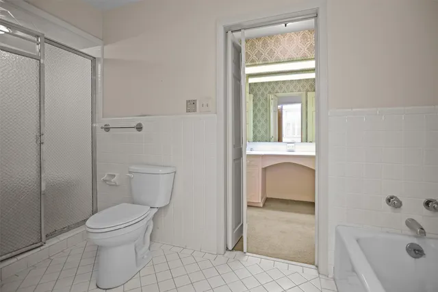 a bathroom with a double vanity sink and mirror