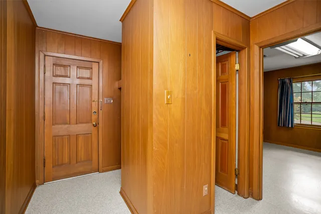 a room with a sink and a window