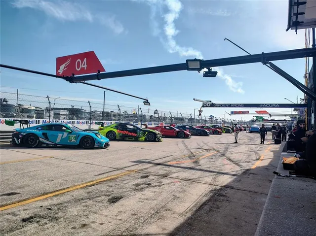 a view of a swimming pool and a yard