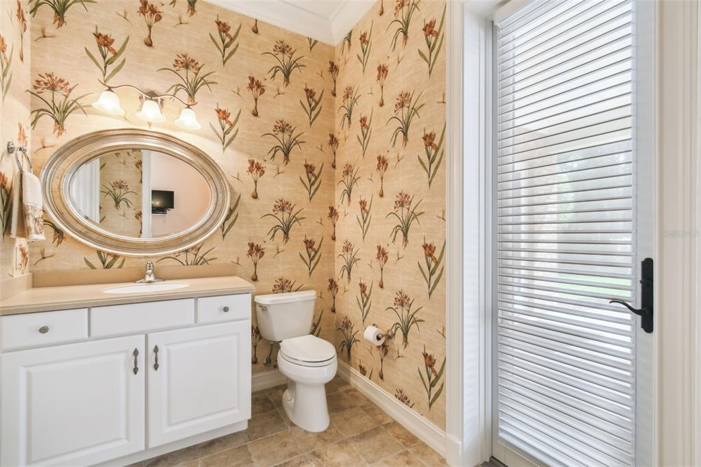 1745 Taylor Woods Road DeLand, FL 32724 - Photo 35 of 66 a bathroom with a sink a toilet and a mirror