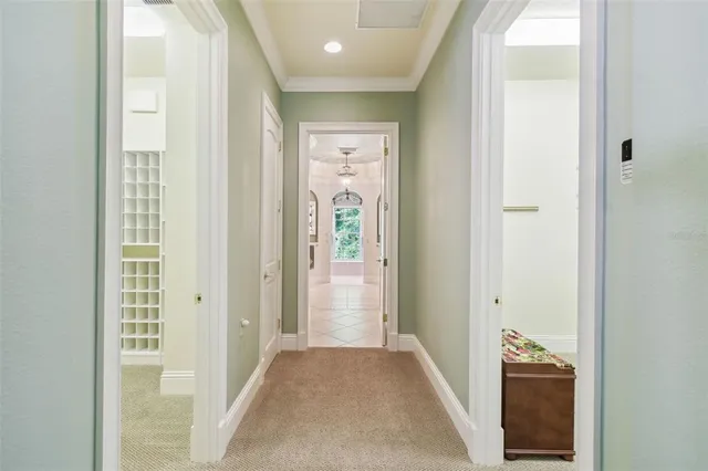 a view of a balcony with chairs and wooden floor