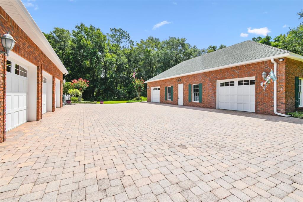 1745 Taylor Woods Road DeLand, FL 32724 - Photo 4 of 66 a front view of a house with a yard and trees