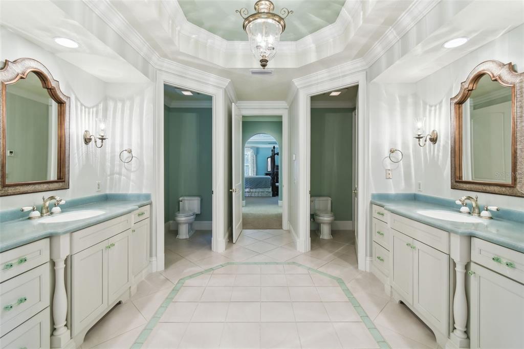 1745 Taylor Woods Road DeLand, FL 32724 - Photo 42 of 66 a spacious bathroom with a double vanity sink and a mirror