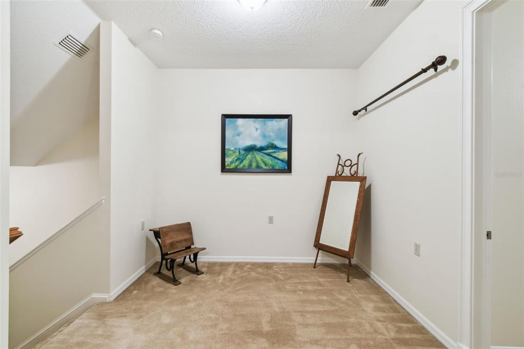 1745 Taylor Woods Road DeLand, FL 32724 - Photo 46 of 66 a view of a hallway with workspace and a window