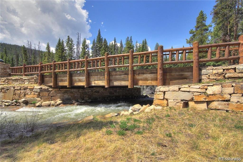 82 Wolf Rock Road Keystone, CO 80435 - Photo 2 of 26 a view of a balcony with lake view and sitting space