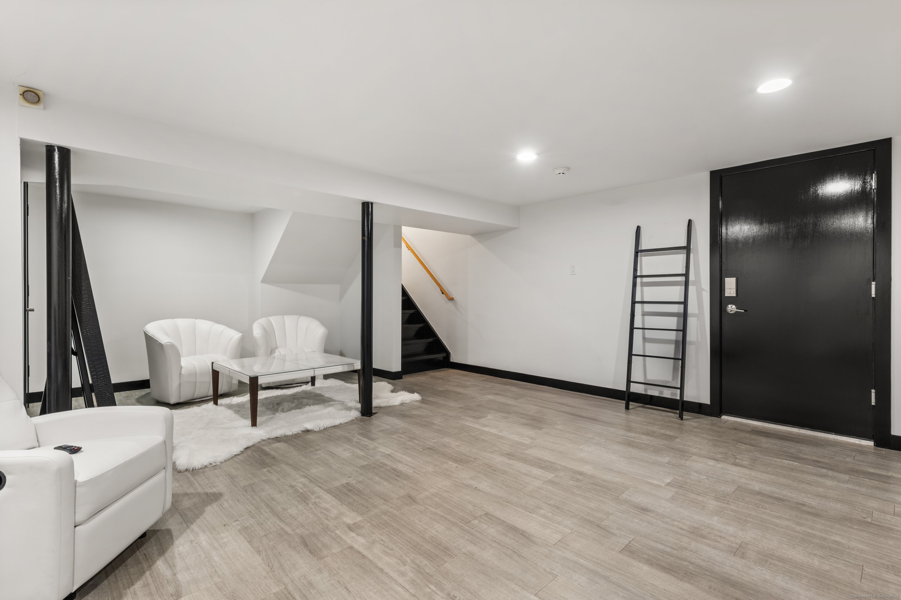 200 Hillspoint Road Westport, CT 06880 - Photo 33 of 37 a view of a room with a bench