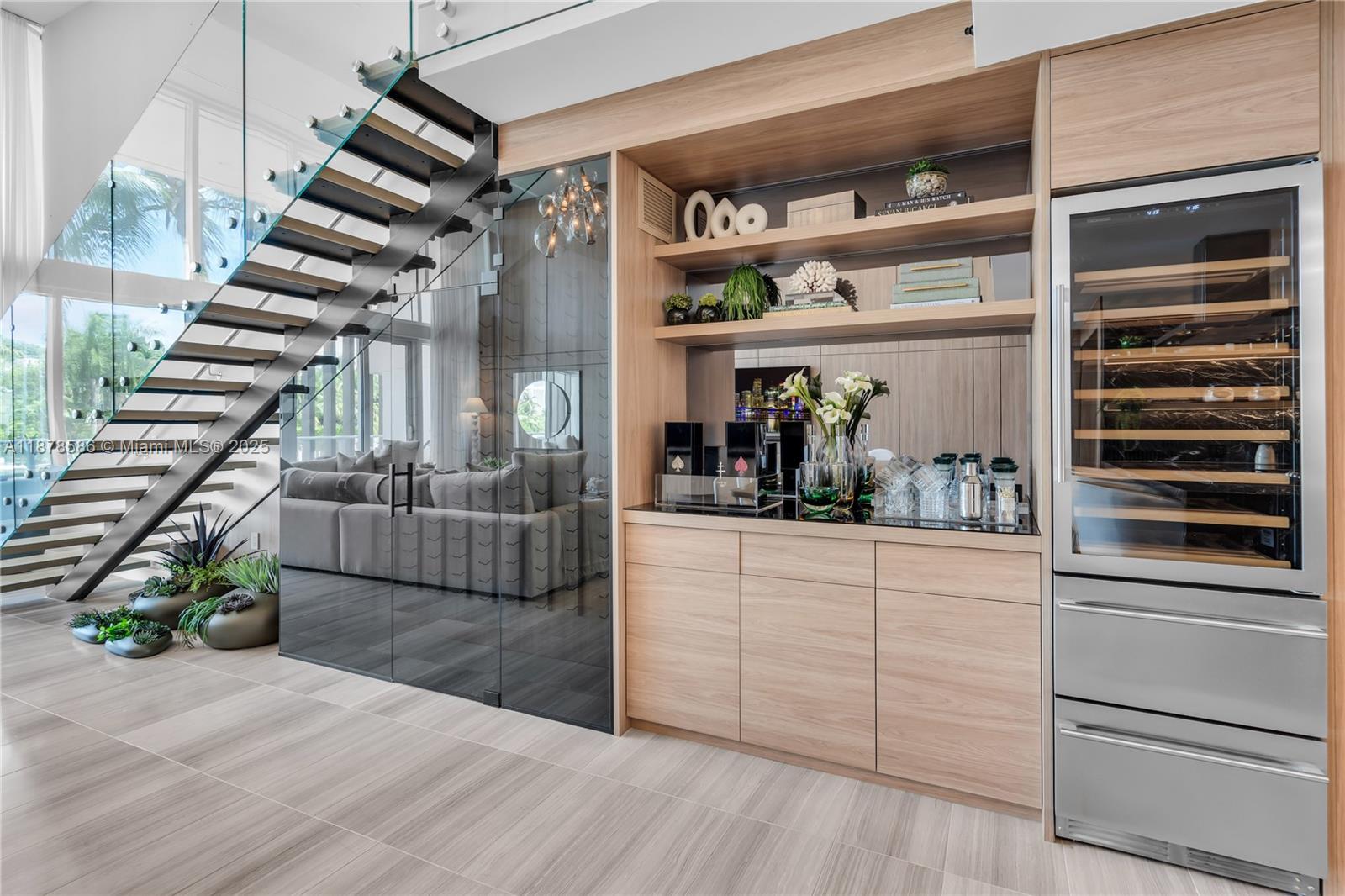 4701 Meridian Avenue, Unit 222 Miami Beach, FL 33140 - Photo 14 of 44 a kitchen with appliances cabinets and a potted plant