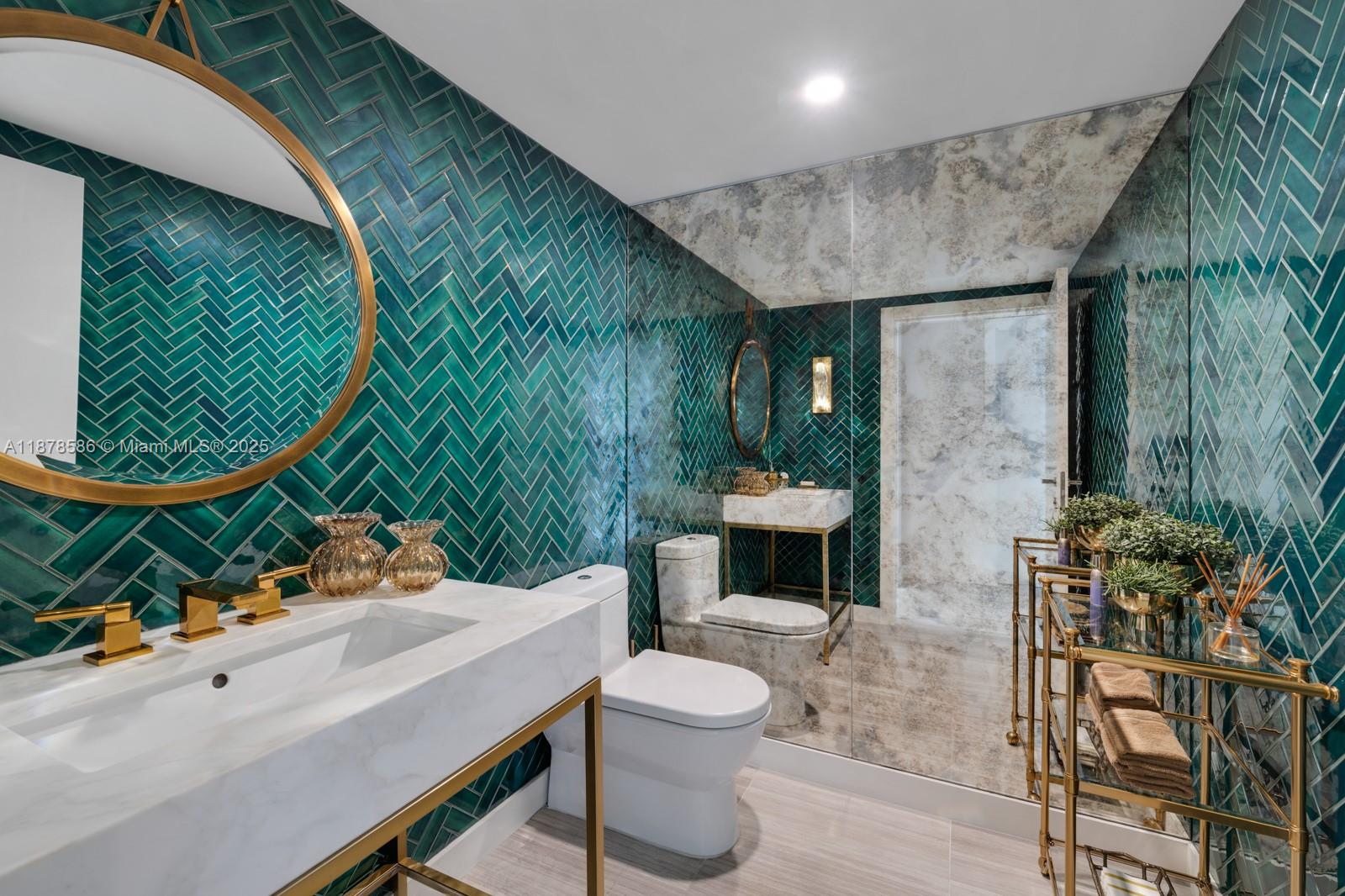 4701 Meridian Avenue, Unit 222 Miami Beach, FL 33140 - Photo 29 of 44 a patio with a table and chairs