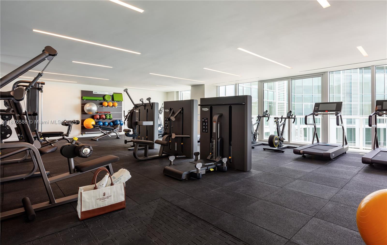 4701 Meridian Avenue, Unit 222 Miami Beach, FL 33140 - Photo 40 of 44 a view of a room with gym equipment