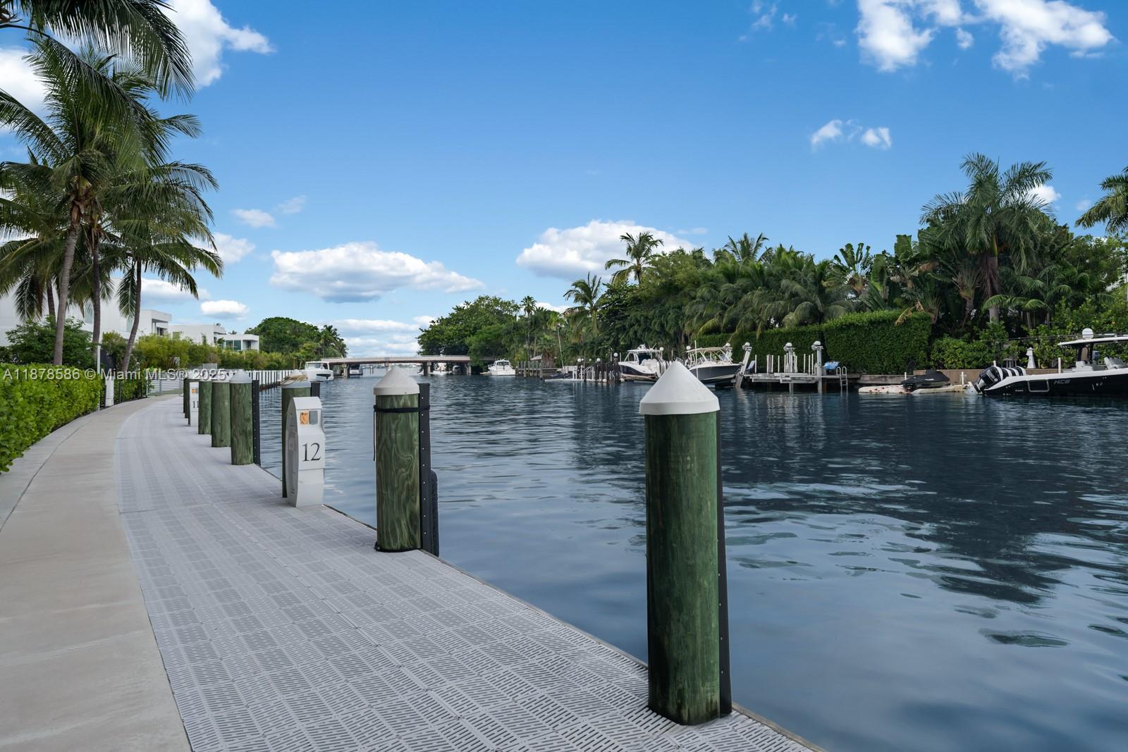 4701 Meridian Avenue, Unit 222 Miami Beach, FL 33140 - Photo 5 of 44 a front view of a house with a yard