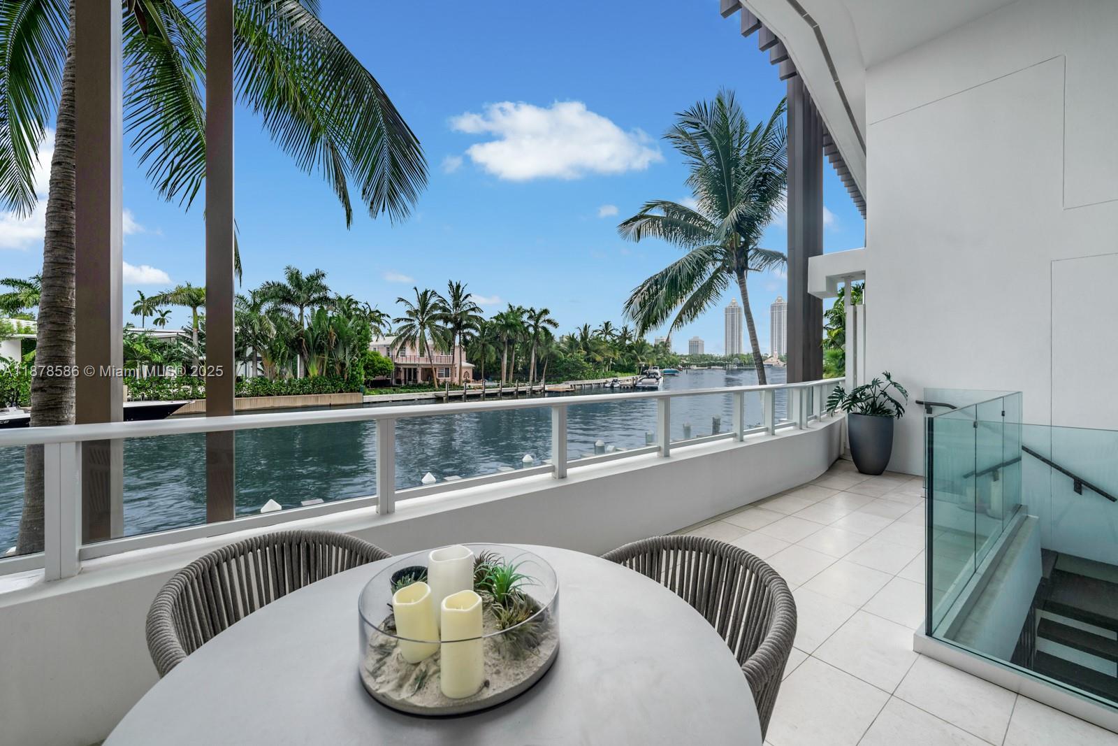 4701 Meridian Avenue, Unit 222 Miami Beach, FL 33140 - Photo 6 of 44 a view of a balcony with lake view