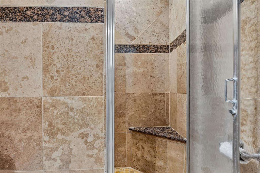 13440 1st Street East Madeira Beach, FL 33708 - Photo 24 of 44 a bathroom with a shower