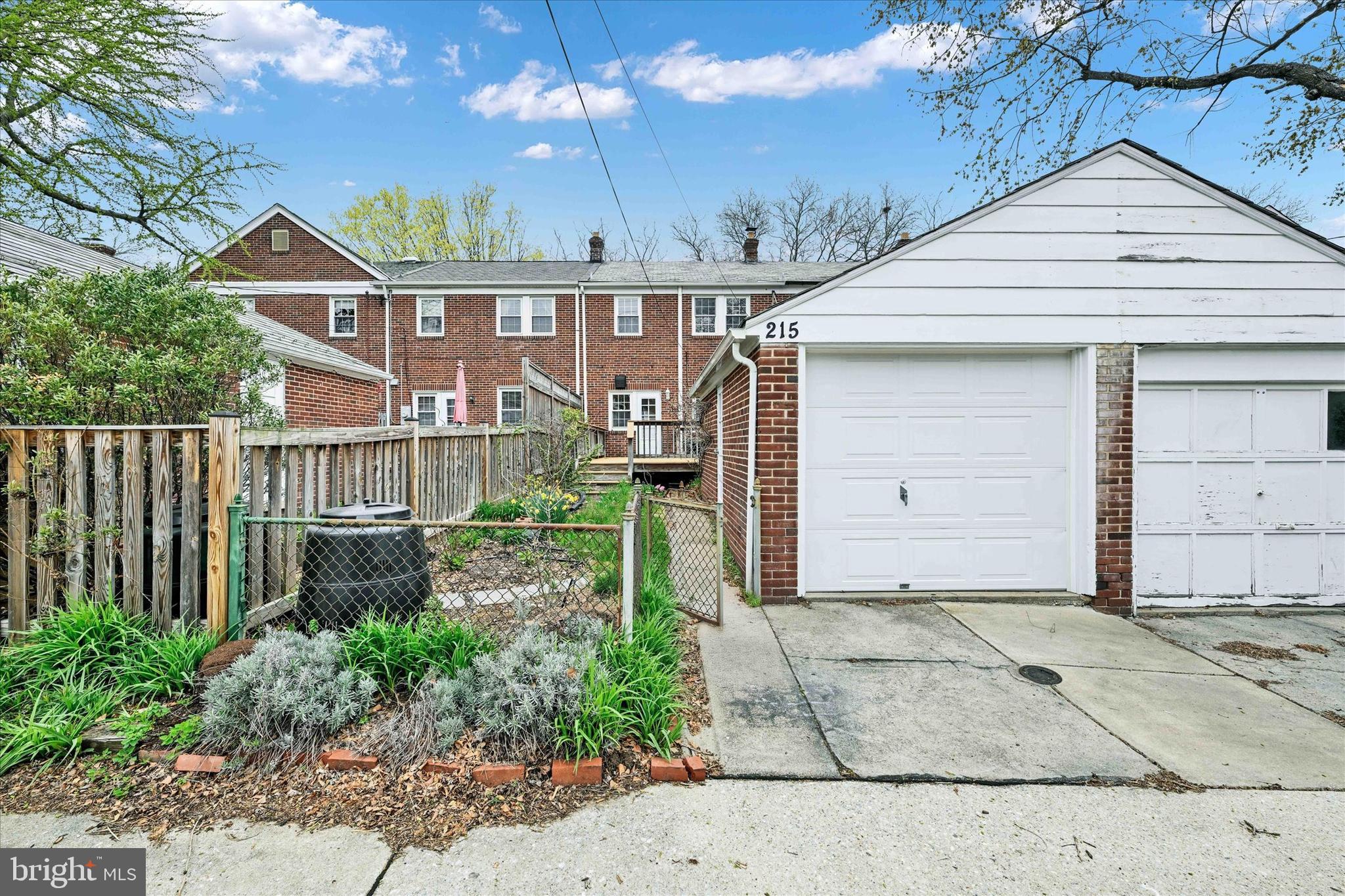 215 Regester Avenue Baltimore, MD 21212 - Photo 24 of 24 a front view of a house with garden