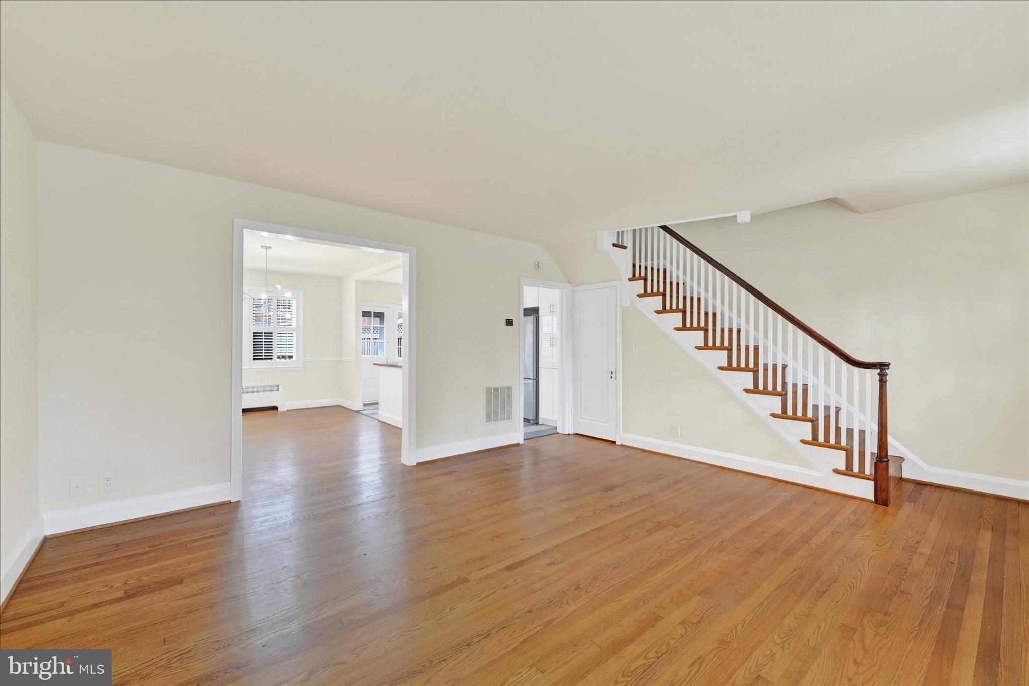 215 Regester Avenue Baltimore, MD 21212 - Photo 5 of 24 a view of an entryway with wooden floor