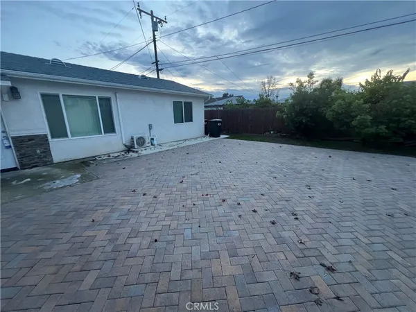 a view of a backyard of a house