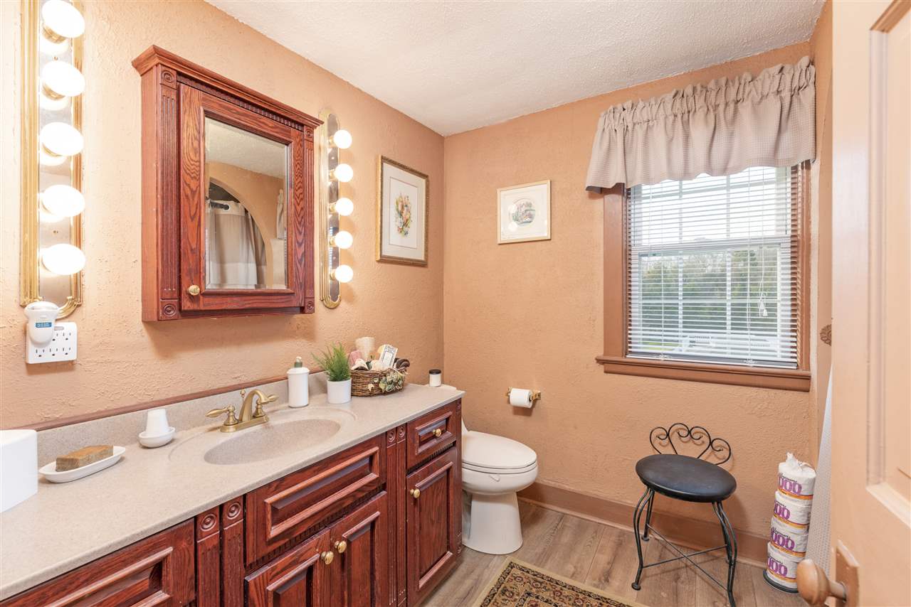 186 Niswander Road Staunton, VA 24401 - Photo 45 of 49 a bathroom with a granite countertop sink mirror and toilet