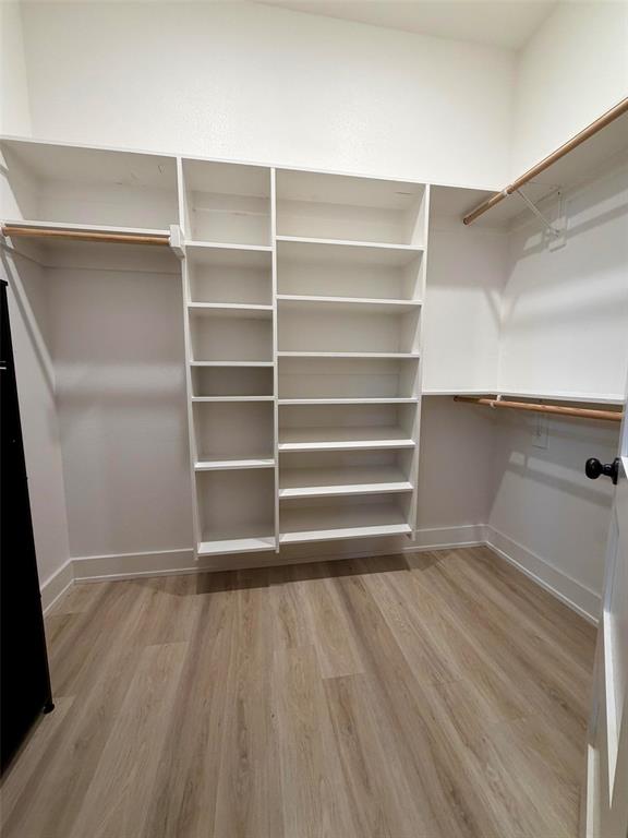 151 Gopher Road Weatherford, TX 76088 - Photo 13 of 22 a view of a room with storage and racks on it