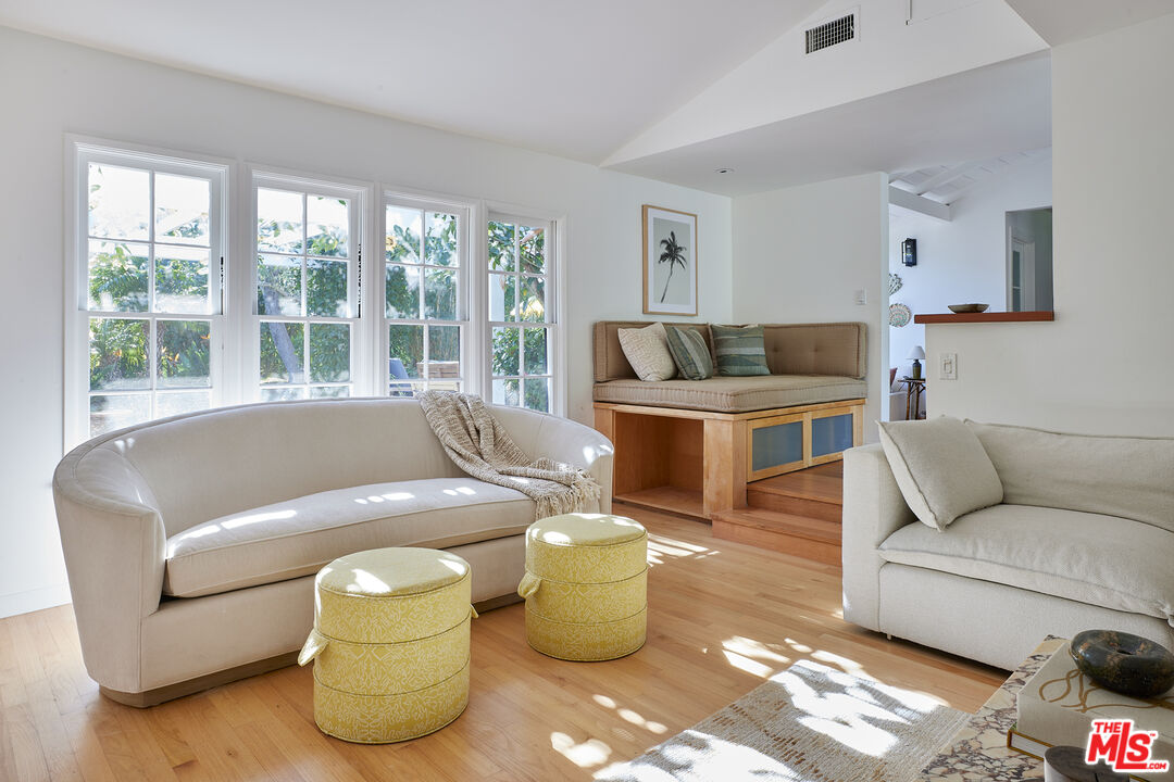 6637 Zumirez Drive Malibu, CA 90265 - Photo 23 of 29 a living room with furniture and a window