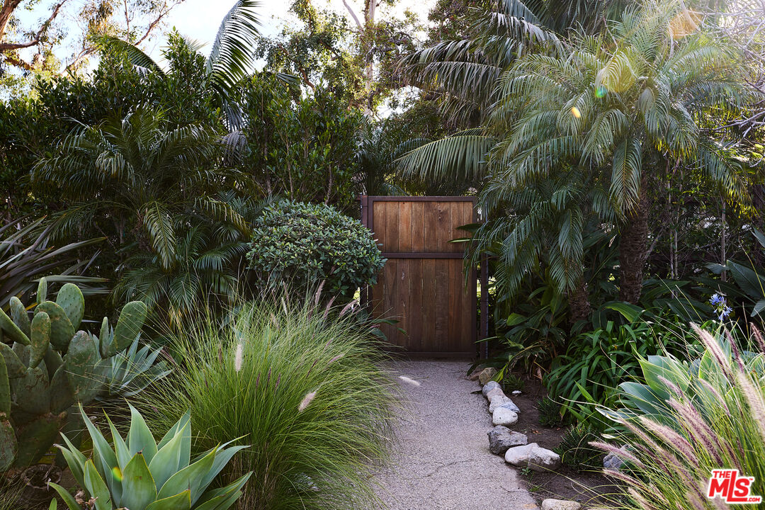 6637 Zumirez Drive Malibu, CA 90265 - Photo 27 of 29 a view of a garden