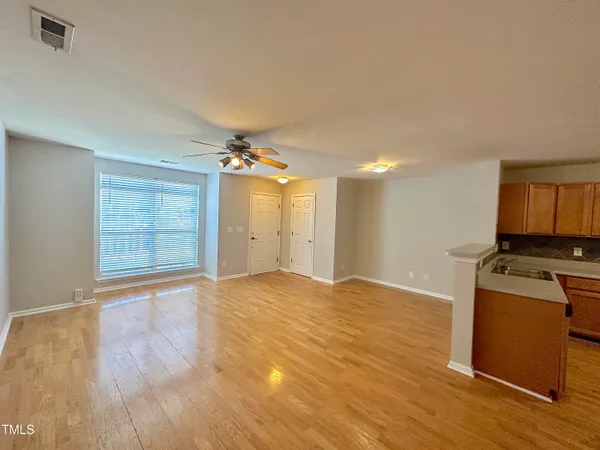 a view of a kitchen and a window