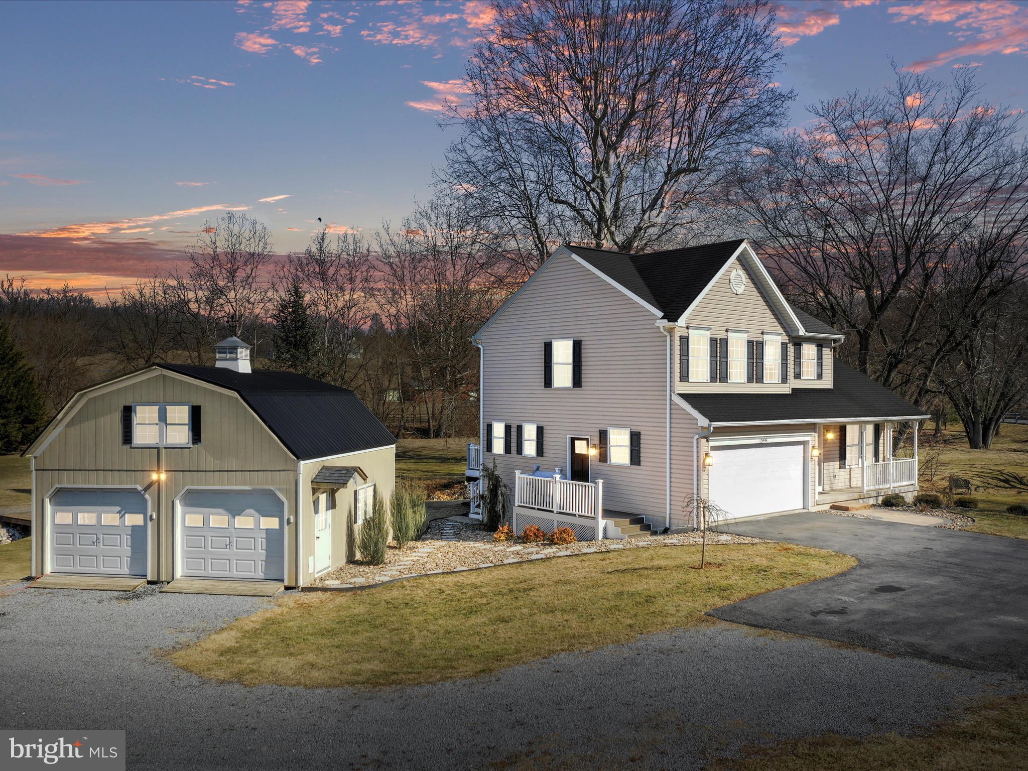 Detached garage has separate panel box and loft!