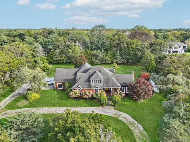 an aerial view of a house with garden