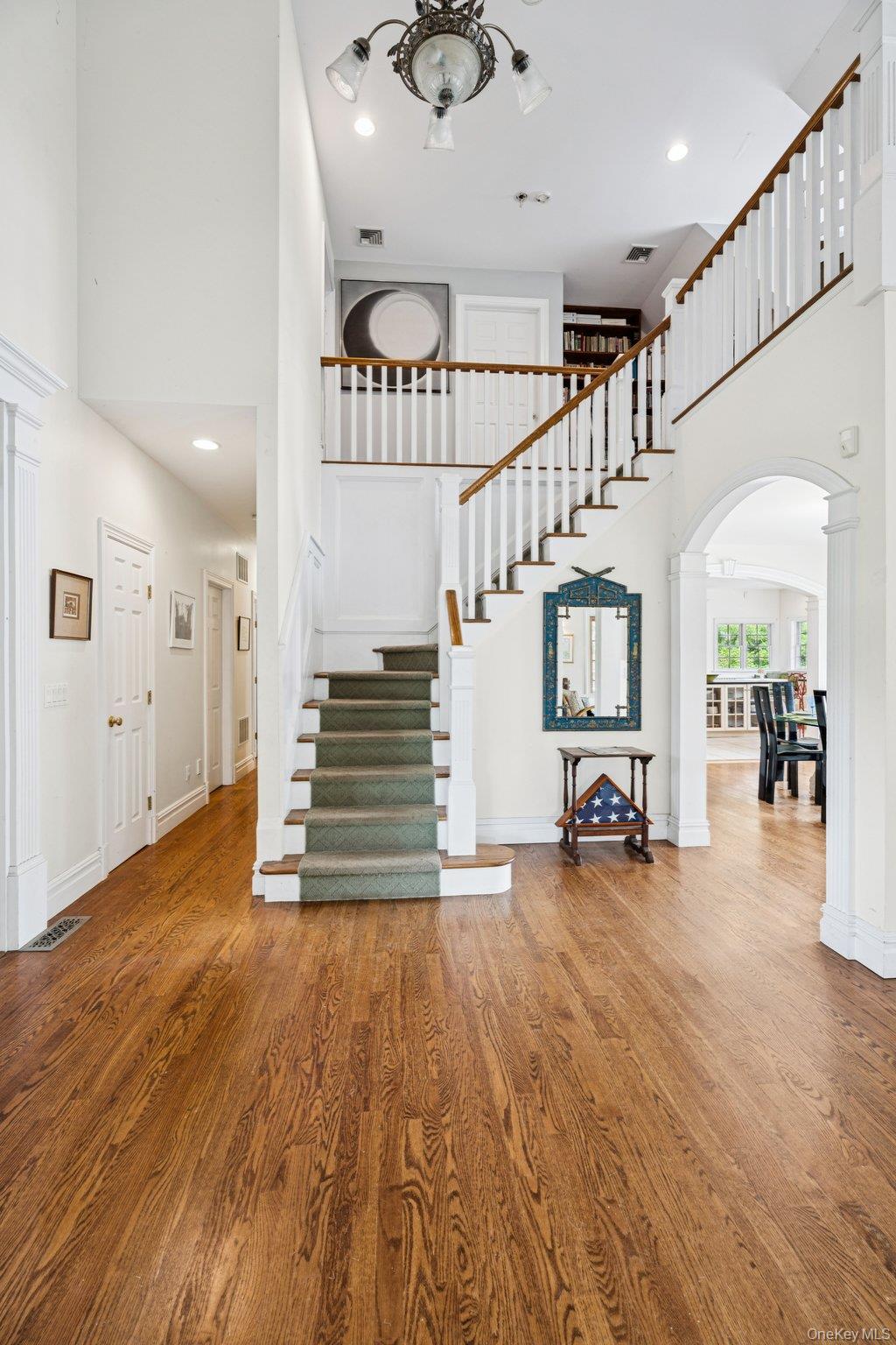 12 Laila Lane Remsenburg, NY 11960 - Photo 24 of 49 a view of entryway and hall with wooden floor