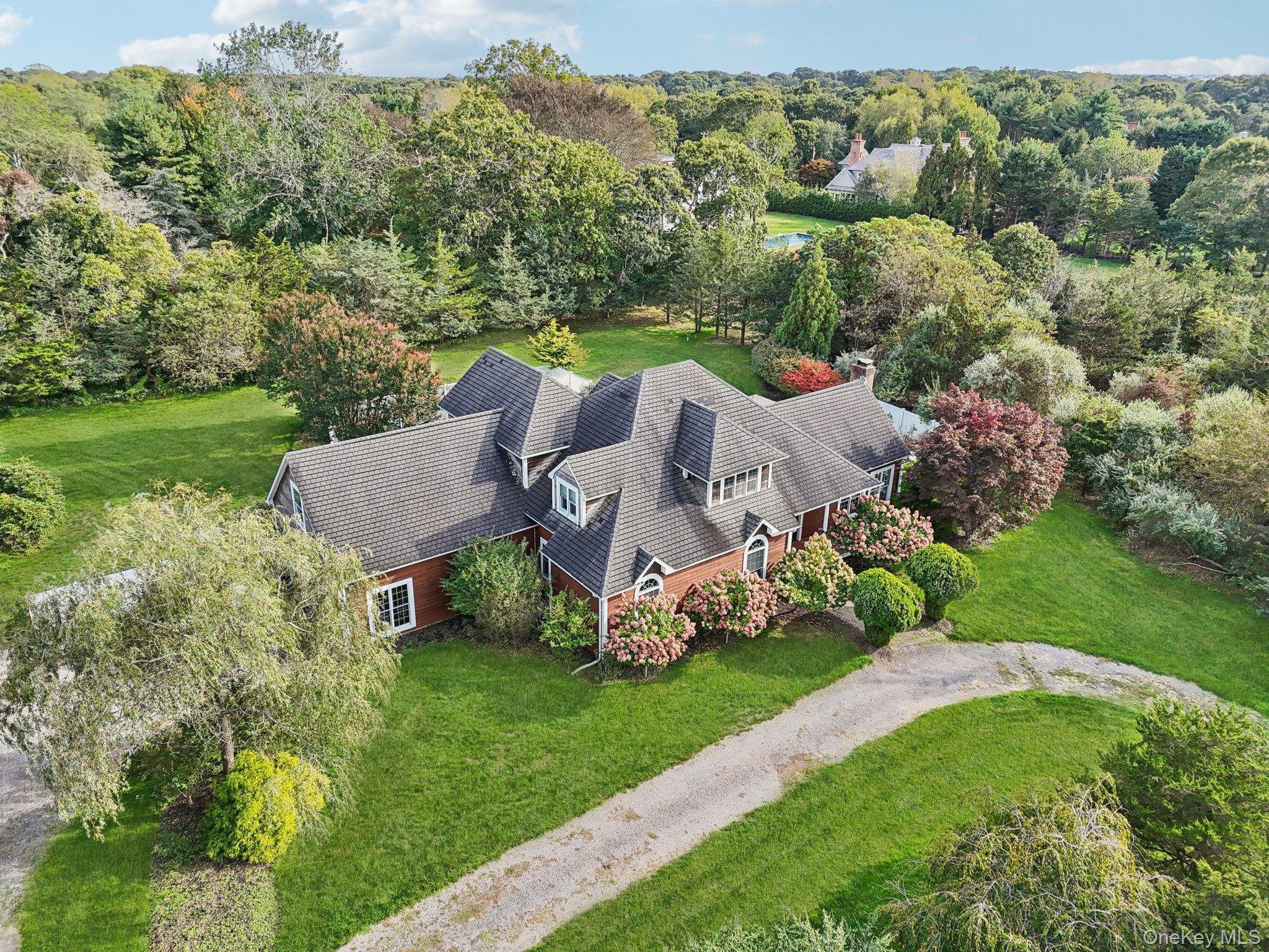 12 Laila Lane Remsenburg, NY 11960 - Photo 4 of 50 a aerial view of a house with garden
