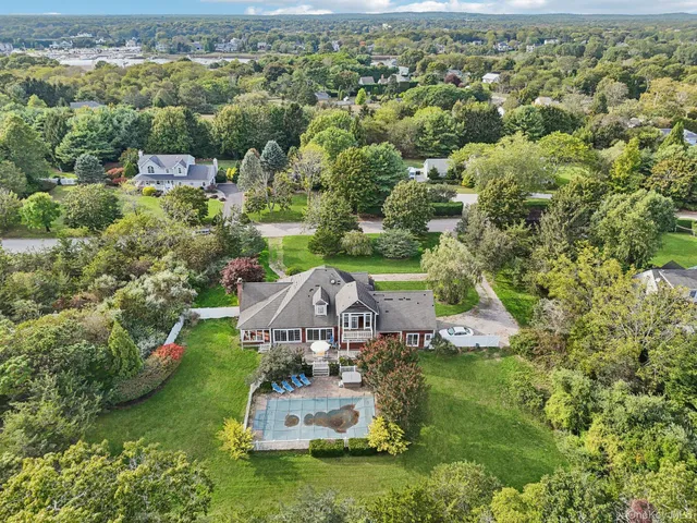 an aerial view of a house with a garden