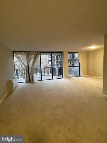 a view of large room with windows