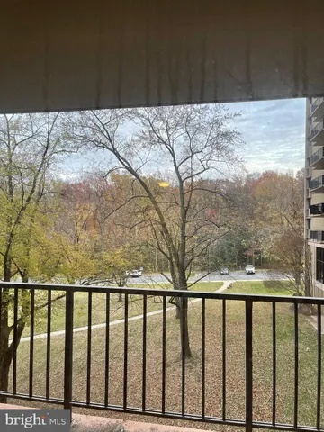 a view of a wooden fence