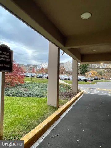 a view of swimming pool from a balcony