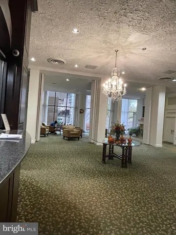 a view of a living room and dining room