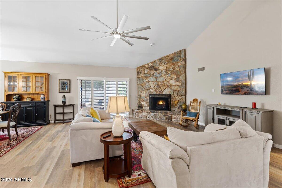 18425 East 4 Peaks Boulevard Rio Verde, AZ 85263 - Photo 11 of 75 a living room with furniture and a flat screen tv