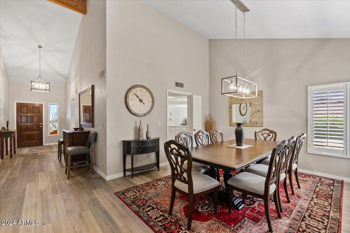18425 East 4 Peaks Boulevard Rio Verde, AZ 85263 - Photo 12 of 75 a view of a dining room with furniture a rug and wooden floor