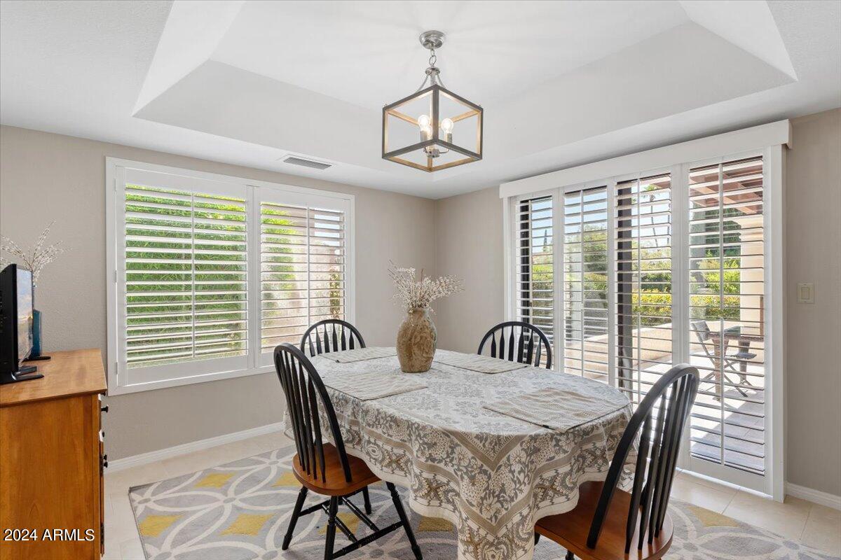 18425 East 4 Peaks Boulevard Rio Verde, AZ 85263 - Photo 18 of 75 a view of a dining room with furniture window and outside view