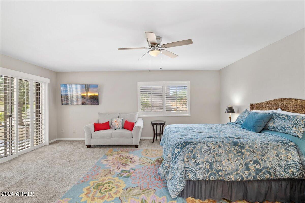 18425 East 4 Peaks Boulevard Rio Verde, AZ 85263 - Photo 22 of 75 a bedroom with a bed and a window