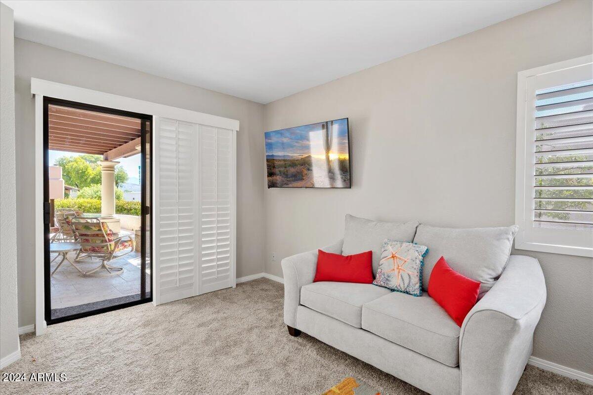 18425 East 4 Peaks Boulevard Rio Verde, AZ 85263 - Photo 24 of 75 a living room with furniture and a window