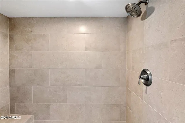 a view of hall way with furniture