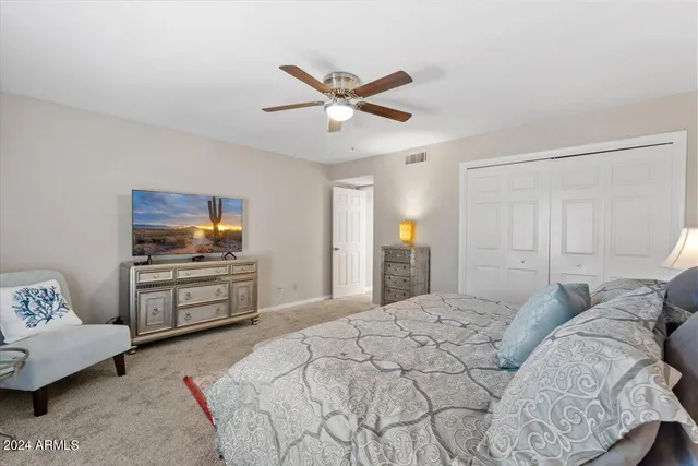 a view of a patio with table and chairs and potted plants