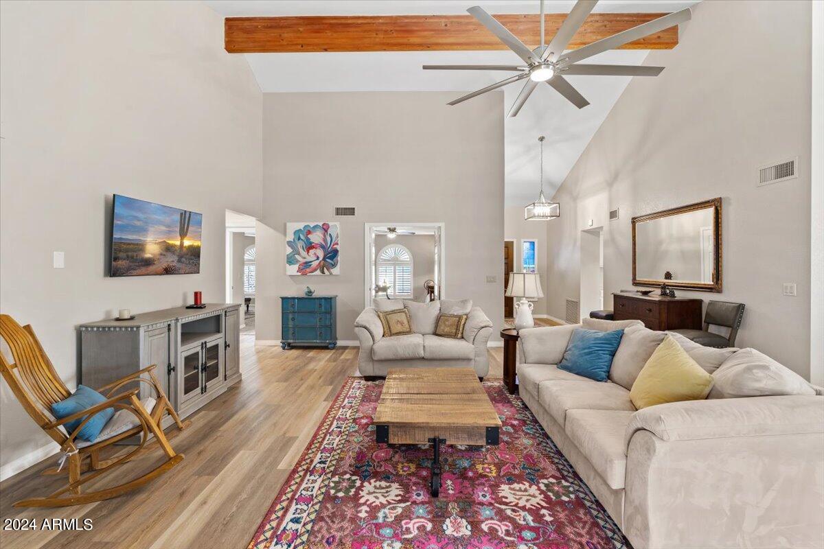 18425 East 4 Peaks Boulevard Rio Verde, AZ 85263 - Photo 9 of 75 a living room with furniture and a flat screen tv