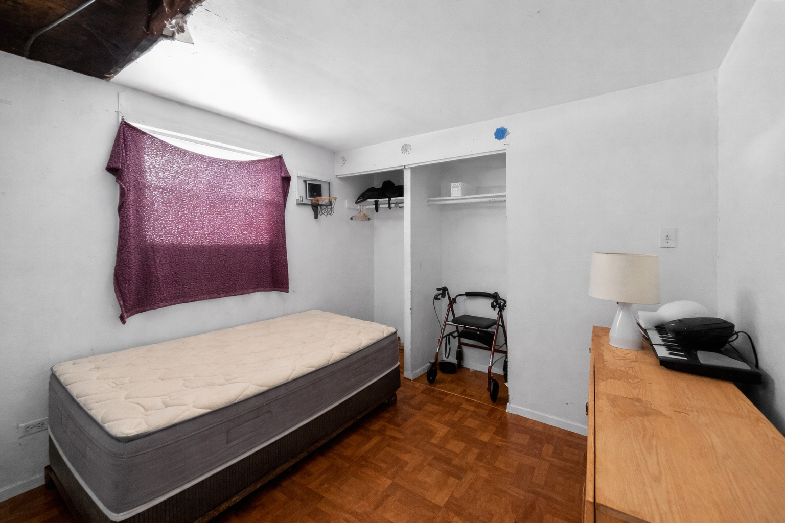 2711 West 165th Street Markham, IL 60428 - Photo 8 of 14 a bed room with a bed and a chair