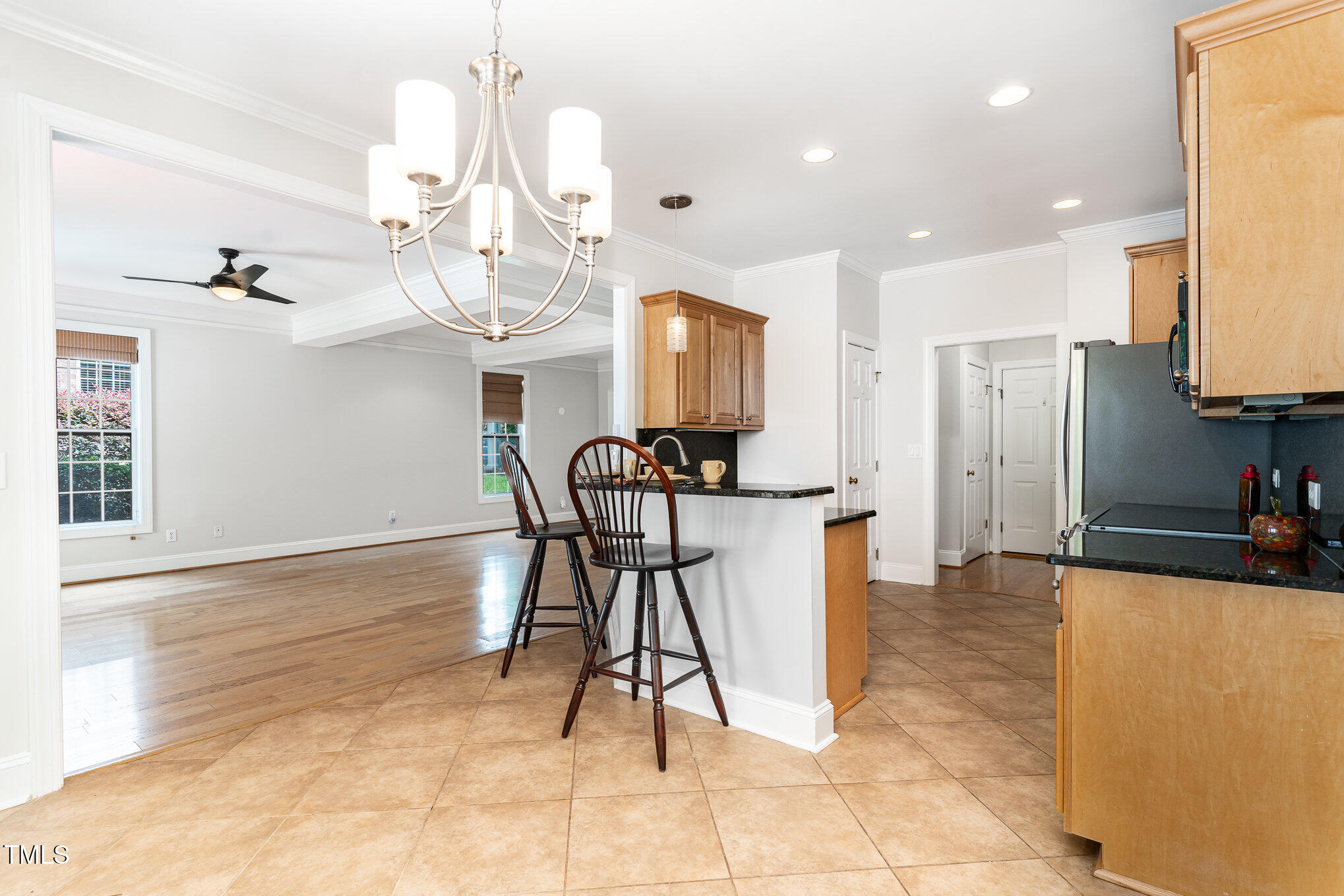 4060 Barton Park Place Raleigh, NC 27613 - Photo 13 of 38 a view of a kitchen and dining area