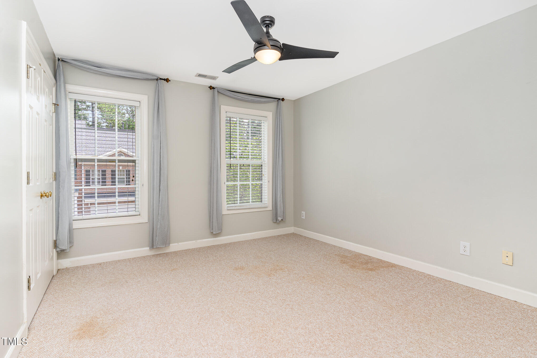 4060 Barton Park Place Raleigh, NC 27613 - Photo 18 of 38 an empty room with a window