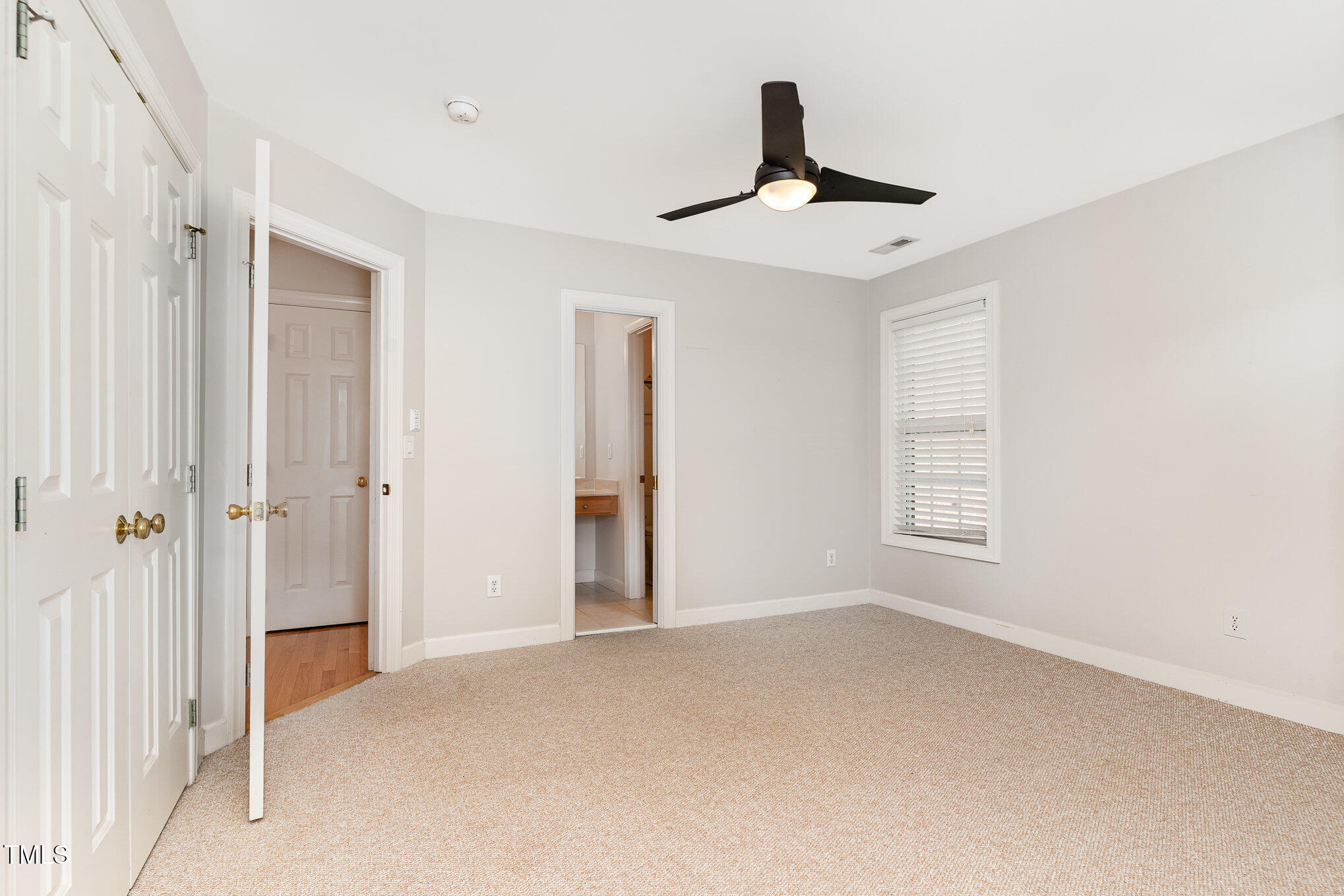4060 Barton Park Place Raleigh, NC 27613 - Photo 21 of 38 a view of an empty room with a window