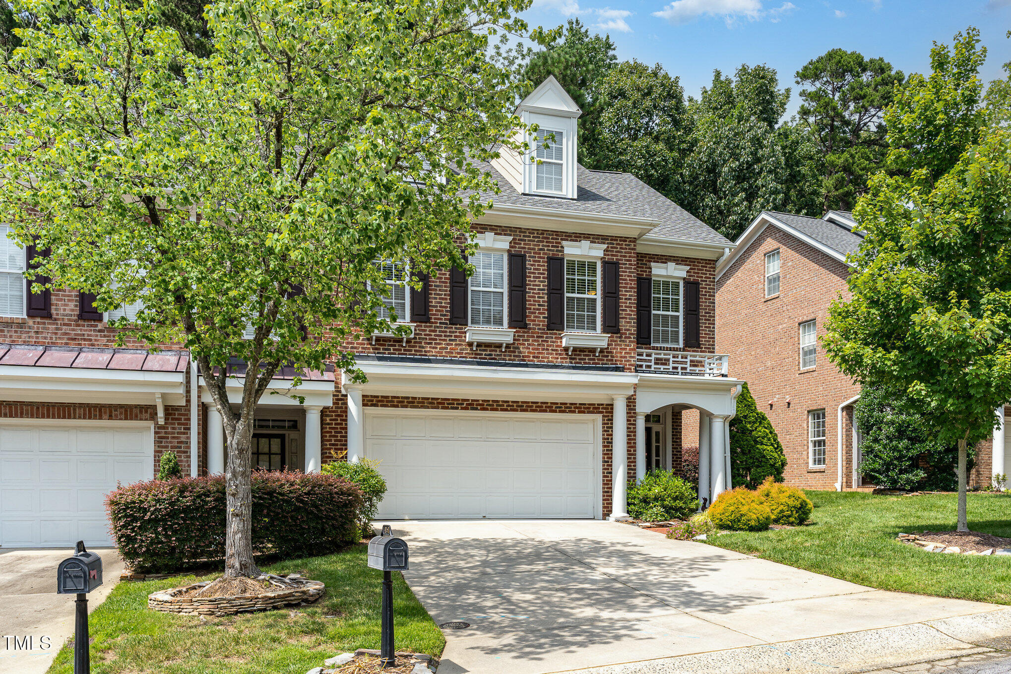 4060 Barton Park Place Raleigh, NC 27613 - Photo 3 of 38 a front view of a house with garden