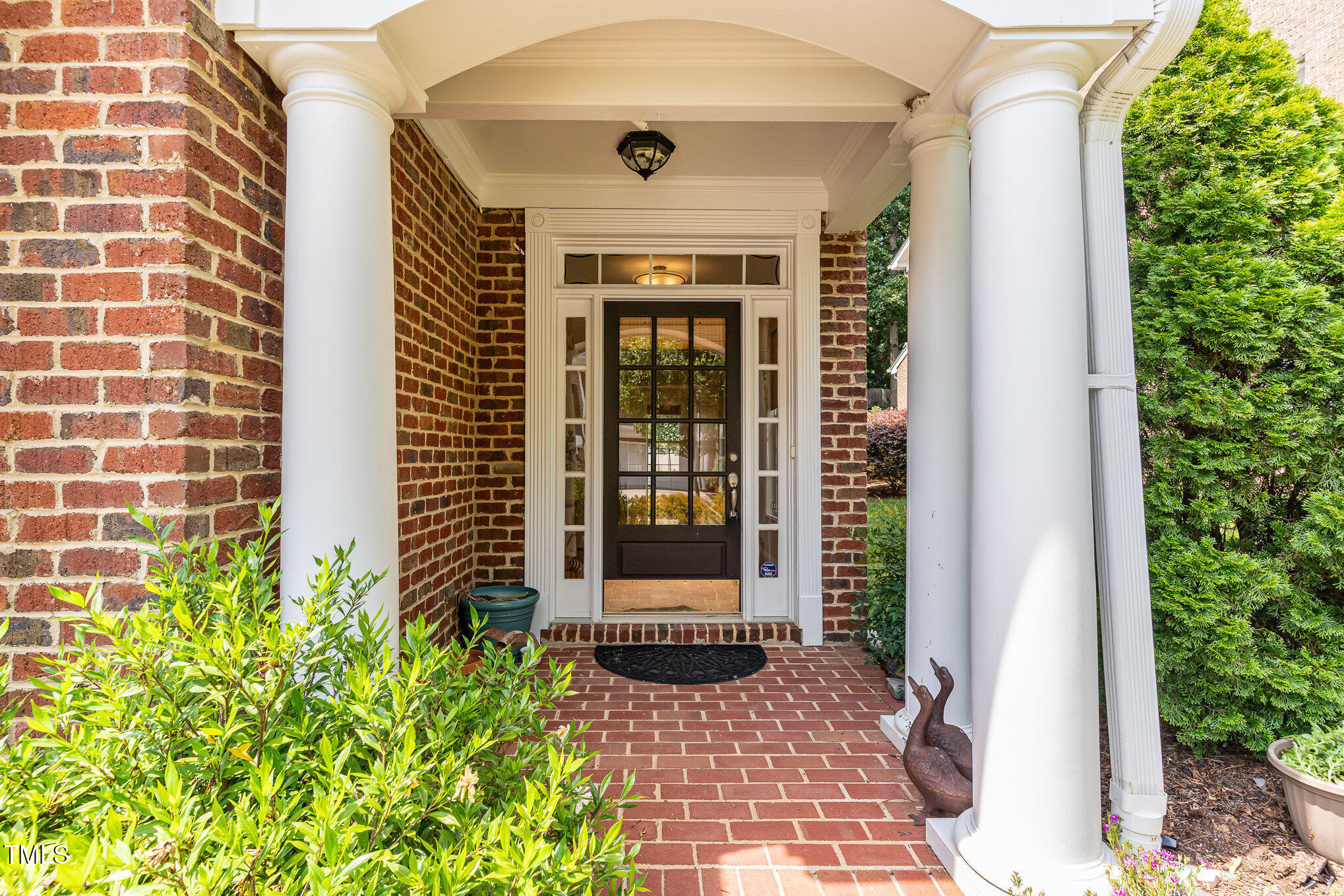 4060 Barton Park Place Raleigh, NC 27613 - Photo 5 of 38 a front view of a house with a large window