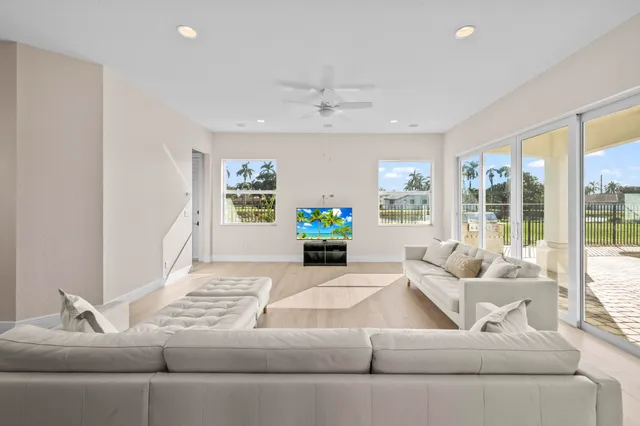 a living room with furniture and a table