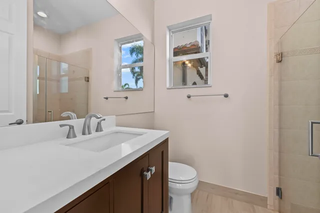 a view of staircase with lots of wooden floor