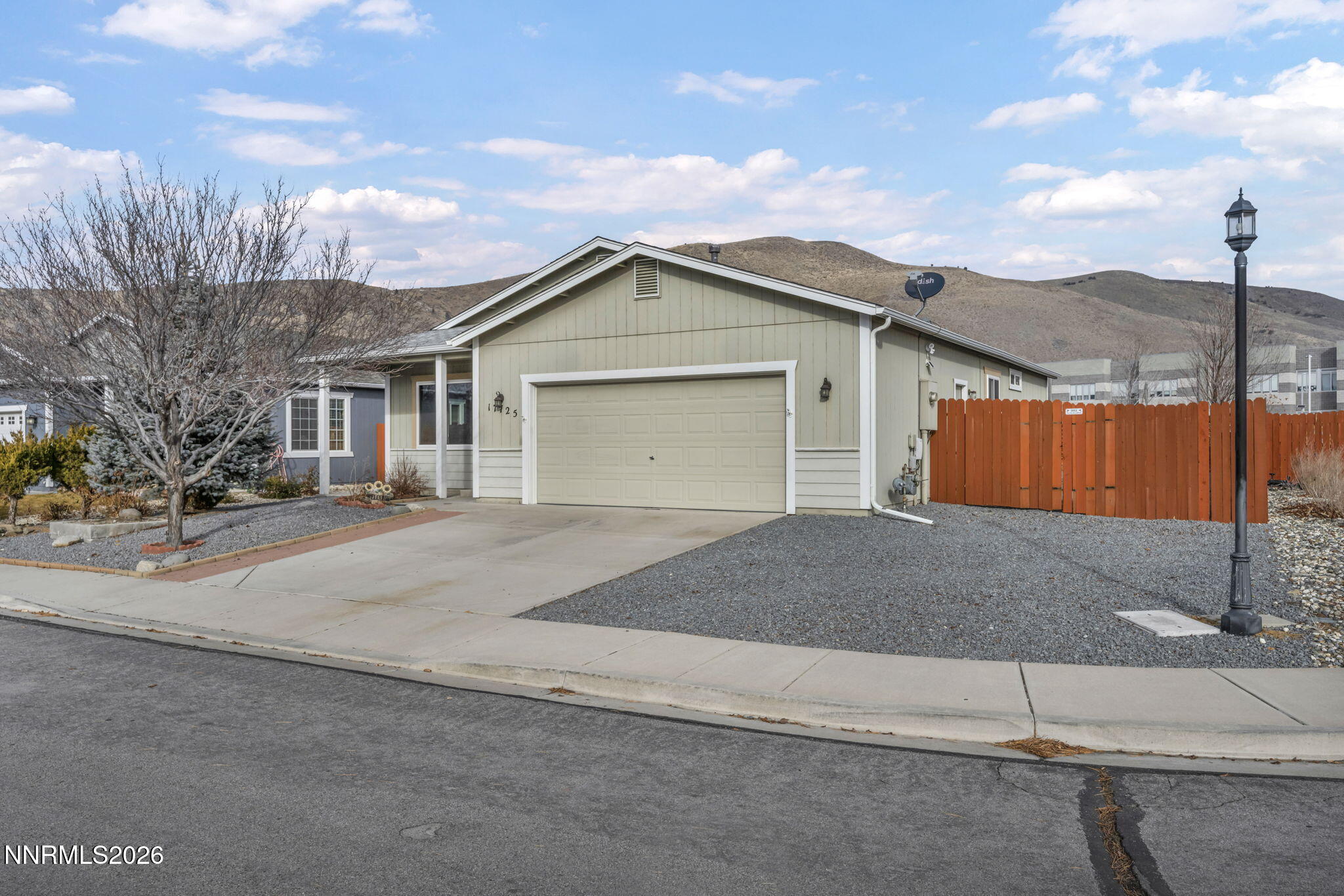 17725 Live Oak Court Reno, NV 89508 - Photo 1 of 44 a front view of a house with a garage